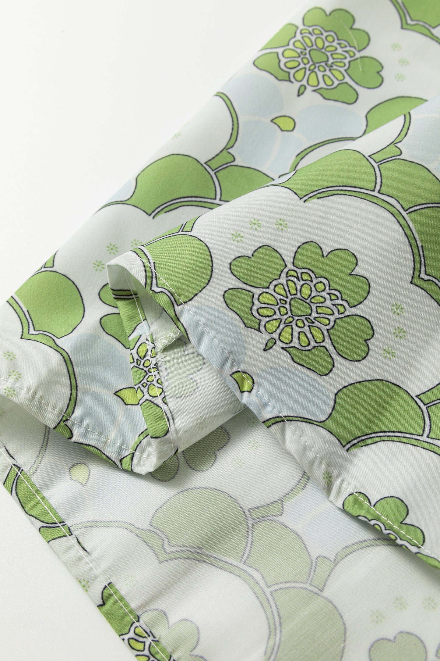 Blouse d'été à manches courtes et volants, imprimé floral vert nuageux