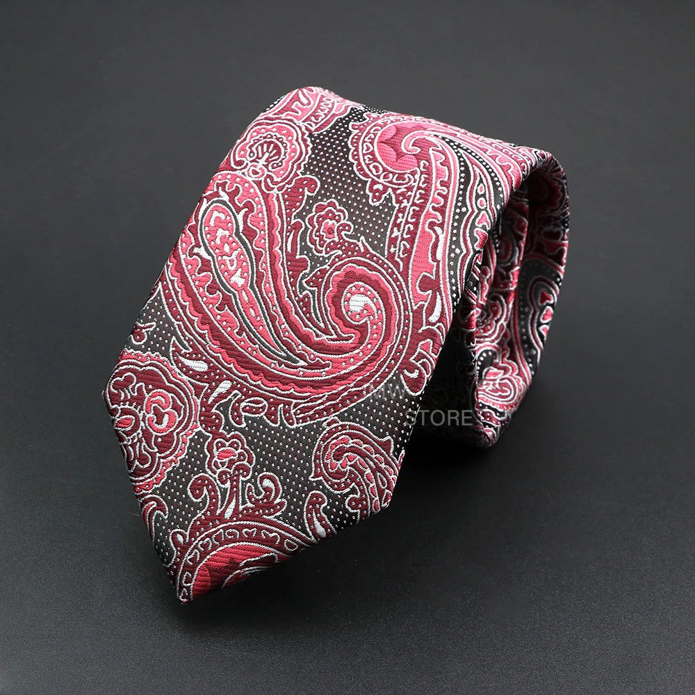 Red paisley patterned tie on a black background