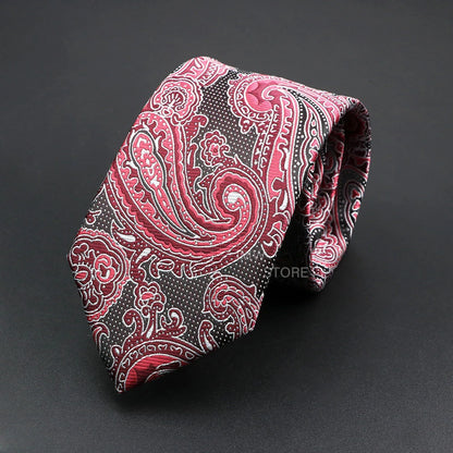 Red paisley patterned tie on a black background