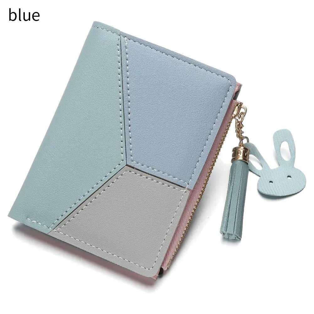 Blue and gray wallet with a tassel on a white background
