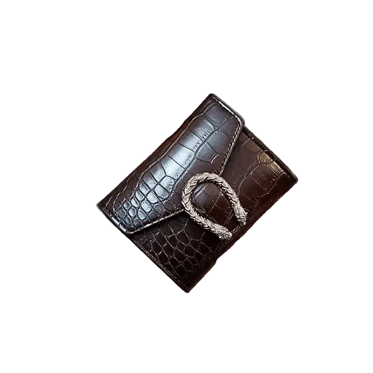 Brown leather wallet with a gold buckle on a white background