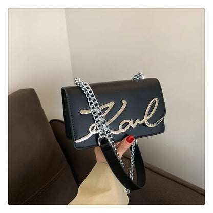 CaRaUaNa Karl Clutch Bag Black