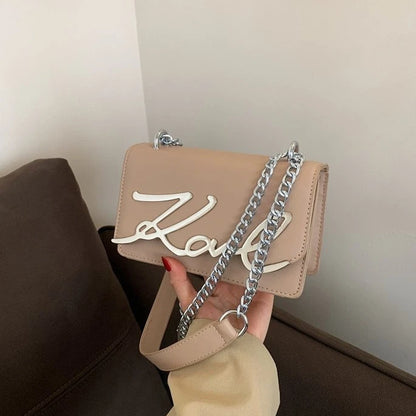 CaRaUaNa Karl Clutch Bag Khk in hand