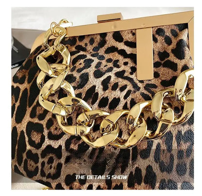 Leopard print clutch with gold chain detail