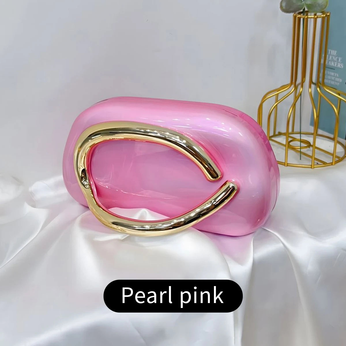 Pink and gold Carauana Festival Clutch Bag