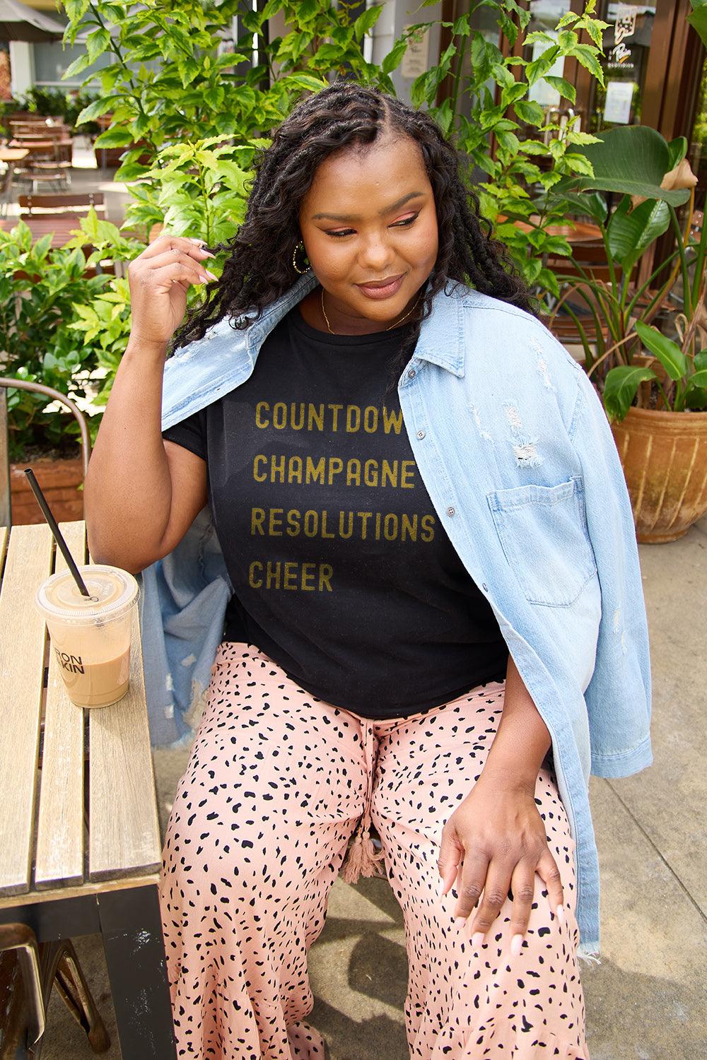 Simply Love Full Size COUNTDOWNS CHAMPAGNE RESOLUTIONS & CHEER Round Neck T-Shirt Carauana Store